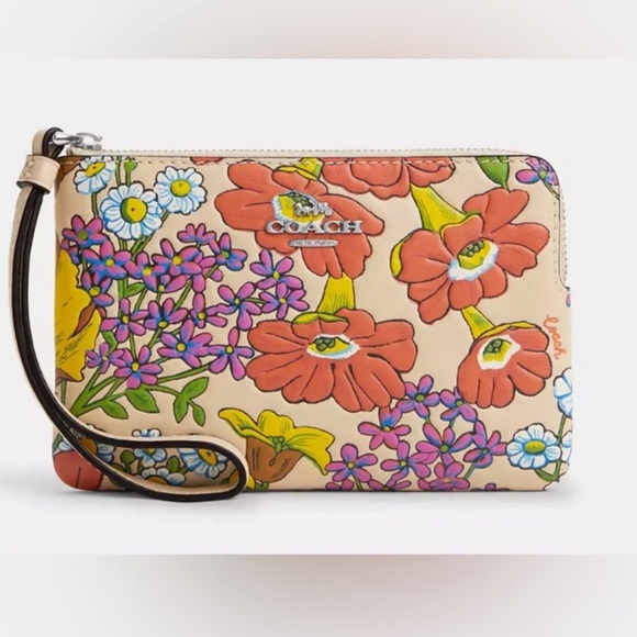 Coach Handbags - NWT Coach Signature Canvas Wristlet With Floral Print